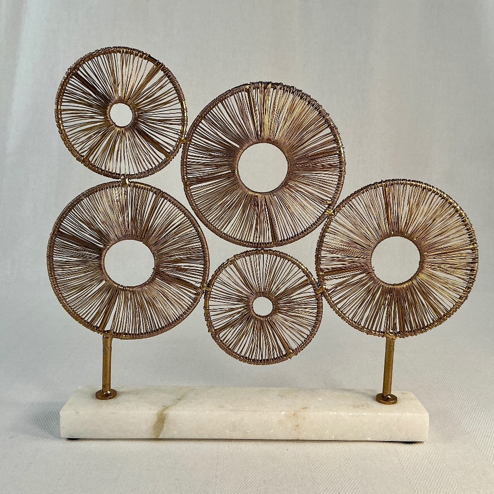 Circle Sculpture on Marble Stand